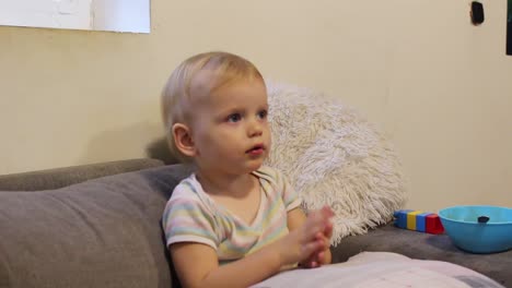 Little-girl-dancing-while-watching-TV