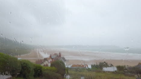 Raindrops-Falling-against-a-Window-with-an-Ocean-View-Sped-Up