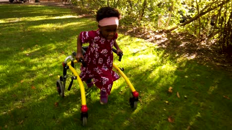 Black-girl-with-Cerebral-Palsy-walking-in-the-park-with-her-assistive-device-1
