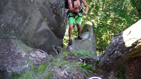 Man-climbing-topless-on-the-rock