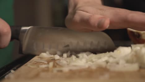 Mincing-White-Onions-Using-Sharp-Knife
