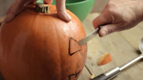 Carving-a-pumpkin-for-a-Halloween-Jack-o-Lantern