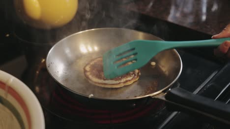 Smoke-Coming-Off-The-Overheated-Frying-Pan-Closely-Burning-The-Pancake-Batter---Close-Up-Shot