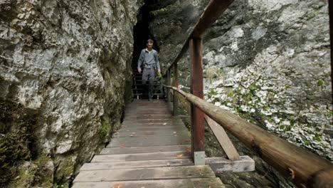 Man-walking-through-Pokljuka-Gorge-in-Slovenia-during-spring-in-the-Triglav-National-Park-8