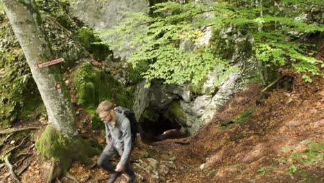 Man-walking-through-Pokljuka-Gorge-in-Slovenia-during-spring-in-the-Triglav-National-Park-10