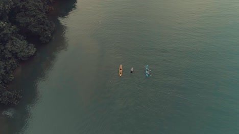 Drone-footage-during-sunset-from-an-elegant-boat-anchored-at-big-river