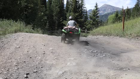 Shot-of-an-ATV-Rider-driving-his-quad-on-a-dirt-path-in-the-Wasatch-Mountains