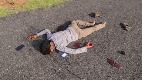 Concept-of-Crime-scene,-Establishing-Shot-a-dead-body-after-murder-laying-on-the-roadside