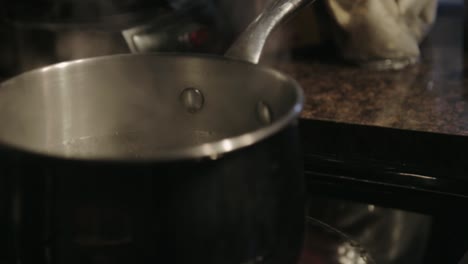 An-Open-Pot-With-Boiling-Water---Close-Up-Shot