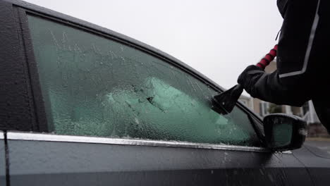 Scratching-ice-on-car-windows