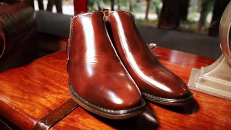 Medium-pillar-up-to-reveal-leather-shoe
