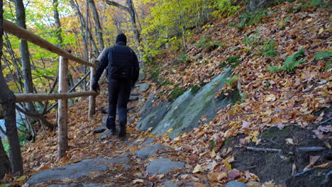 Man-Walking-On-Mountain-Trail-Autumn