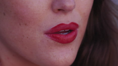 Close-up-of-a-glamorous,-young-woman's-bright,-red-lips
