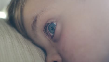 Close-up-on-infant-child's-blue-eyes