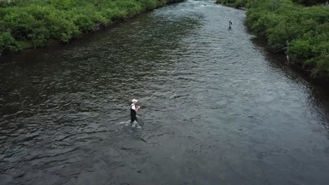 Drone-Shot-above-a-man-Fly-Fishing-in-the-Provo-River-in-the-Mountains-of-Utah-1