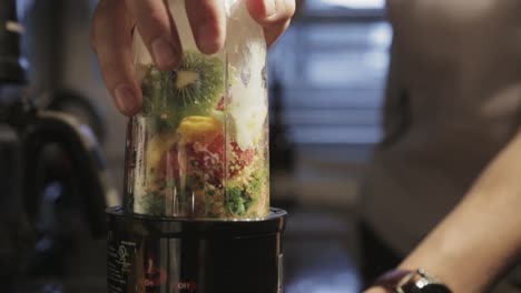 Blending-The-Mixed-Smoothie-Ingredients-With-A-Blender---Close-Up-Shot