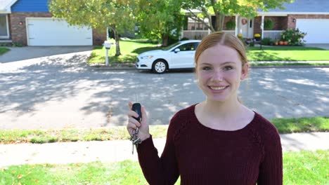 The-new-teenage-driver-shows-off-her-keys-to-the-family-sedan