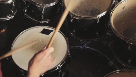 Young-Man-Practicing-His-Electronic-Drumkit-At-Home---Close-Up-Shot