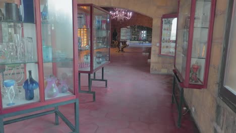 An-inside-view-of-the-Gordiola-Glassworks-and-Museum-Mallorca,-a-large-and-fascinating-collection-of-pieces-tracing-the-manufacturing-history-of-the-glass-works