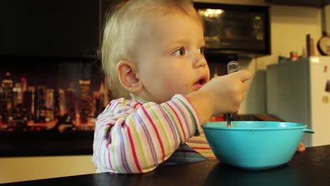 Close-up-little-girl-eating-soup-2