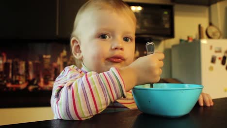 Close-up-little-girl-eating-soup-1