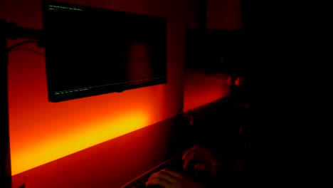 Green-screen:-Caucasian-hands-typing-fast-hacking-into-computer-in-dark-room