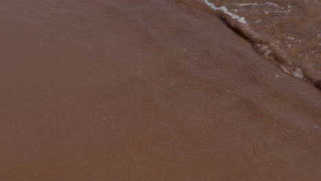 PEI-Red-Sand-Beach-with-Splashing-Water-and-Seaweed