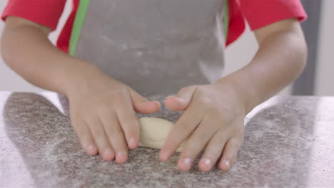Chef-kid-cooking,-cutting-and-baking,-minichef-15