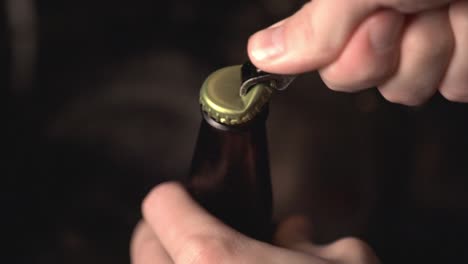 Hand-Of-A-Man-Opening-A-Bottle-Of-Beer---Having-A-Difficulty-Of-Opening-A-Bottle-Of-Beer---close-up-shot