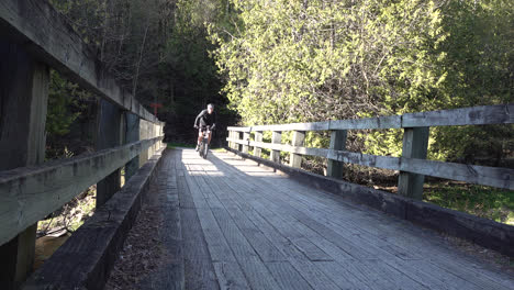 Cyclist-passing-by-on-a-Bridge