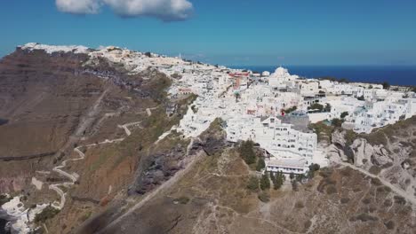 4k-close-aerial-drone-video-footage-of-santorini-fira-city-town-caldera-cliffs