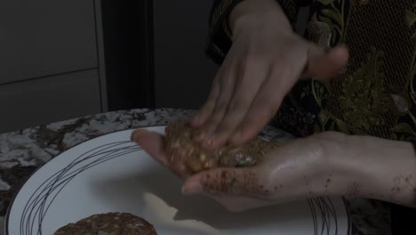 Muslim-Woman-Making-Kebabs-Using-Mince-Meat