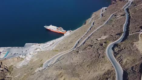 4k-Aerial-drone-view-over-Santorini-port-winding-road