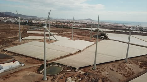 Overrun-with-the-drone-between-windmills-in-a-wind-farm-on-the-island-of-Gran-Canaria,-Canary-Islands