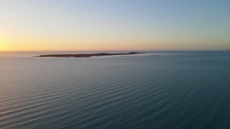 Aerial-View-Of-The-Entires-Flock-Pigeon-Island-During-The-Golden-Dusk-In-QLD,-Australia