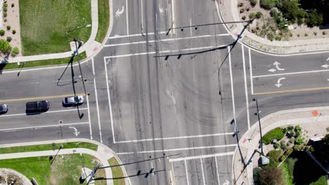 Top-View-Of-An-Intersection-With-Daytime-Traffic-On-A-Sunny-Day