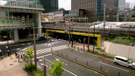Tokyo-Street-With-Bullet-Trains-Running-On-Overpass