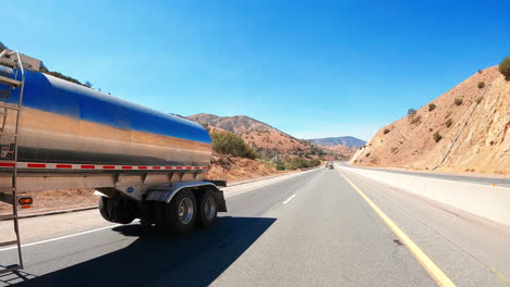Passing-a-tanker-trunk-along-a-southern-California-highway-in-slow-motion