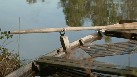 Wooden-rowboat-wreck-relaxing-lake