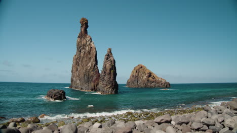 Tall-Lava-Rocks-In-Ocean,-Islet-Towers-In-Ribeira-da-Janela,-Madeira,-Portugal---wide-static-shot