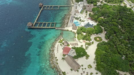 Cozumel-Mexico-Aerial-v17-birds-eye-view-drone-flying-along-las-uvas-shoreline-capturing-beautiful-chankanaab-beach-adventure-park-and-holiday-resorts---September-2020