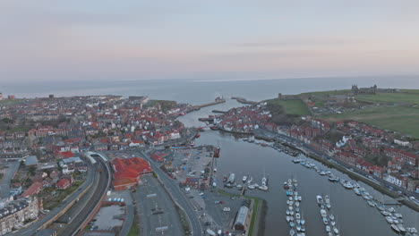 Whitby-North-York-Moors-Heritage-Coast-overflight-of-harbour-early-morning-blue-hour-towards-harbour-mouth-Mavic-3-Cine-PRORES-Clip-1