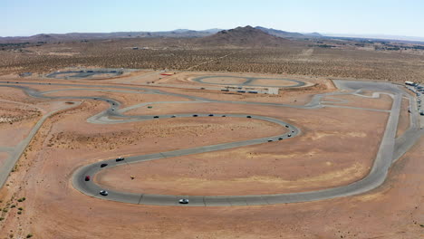 Cars-in-a-competitive-race-compete-for-the-win---aerial-view-of-the-racetrack-complex