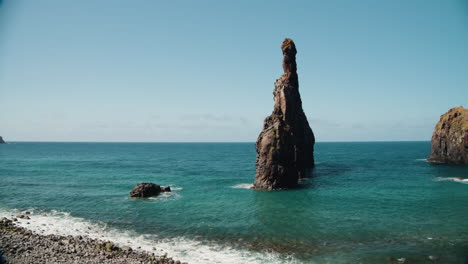 Volcanic-rocky-formation-and-seascape-on-Ribeira-da-Janela,-Madeira,-Portugal---panning-shot