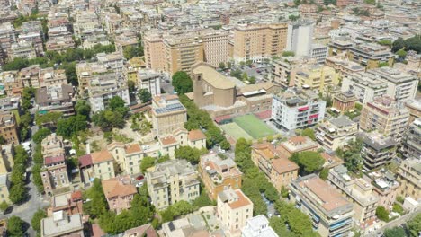 Drone-Flying-Away-from-Densely-Populated-Neighborhood-in-Rome,-Italy