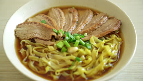Egg-noodles-with-stewed-duck-in-brown-soup---Asian-food-style