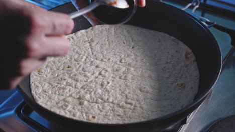 Making-Quick-And-Healthy-Pizza-Snack-With-Tortilla-Wrap-In-A-Pan