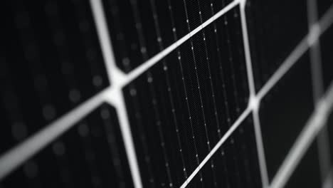 Detailed-moving-close-up-of-a-black-solar-panel