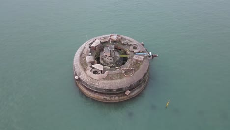 4K-30FPS-Aerial-drone-flight-around-the-derelict-Horse-Sand-Fort-in-the-English-channel-showing-a-birdseye-view-of-the-smaller-of-three-forts