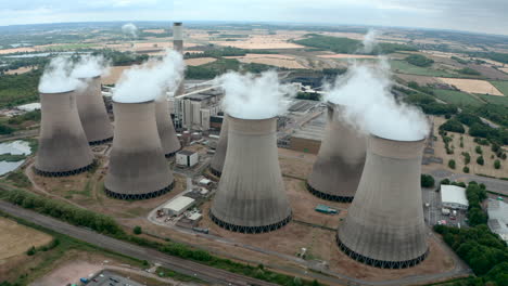 Wide-circling-drone-shot-of-Large-power-plant-cooling-towers